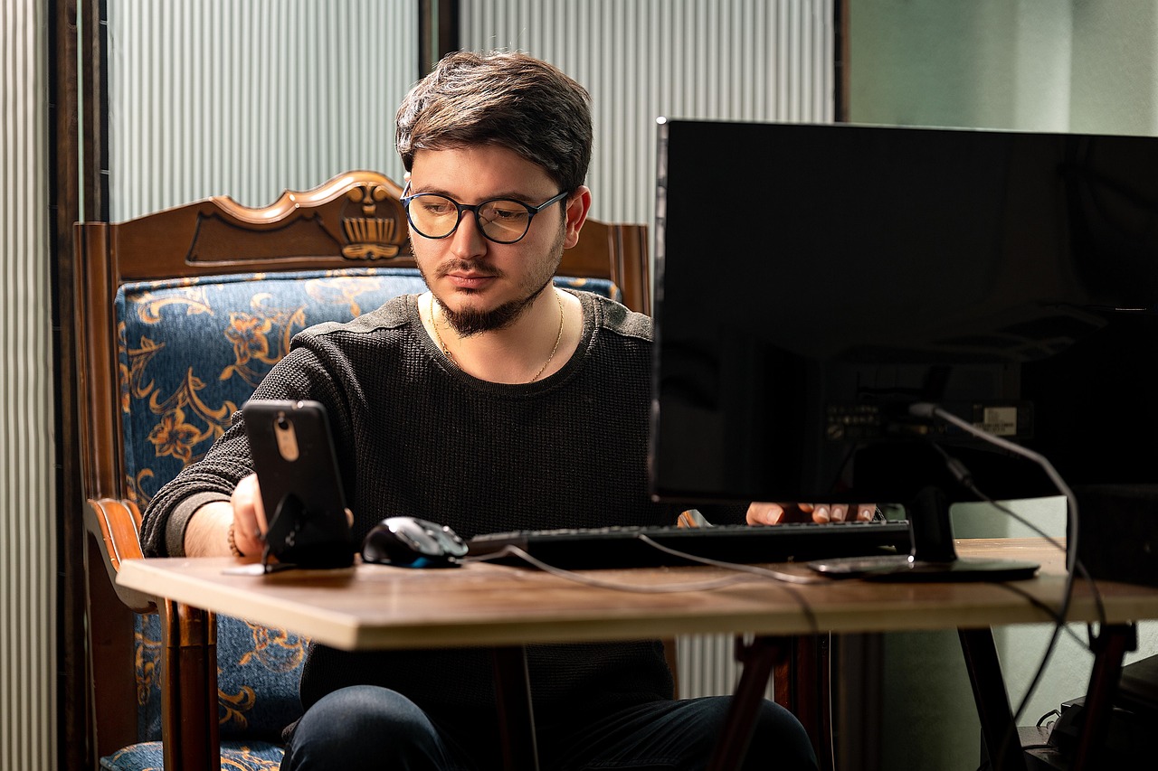 person using ai video editing software on laptop